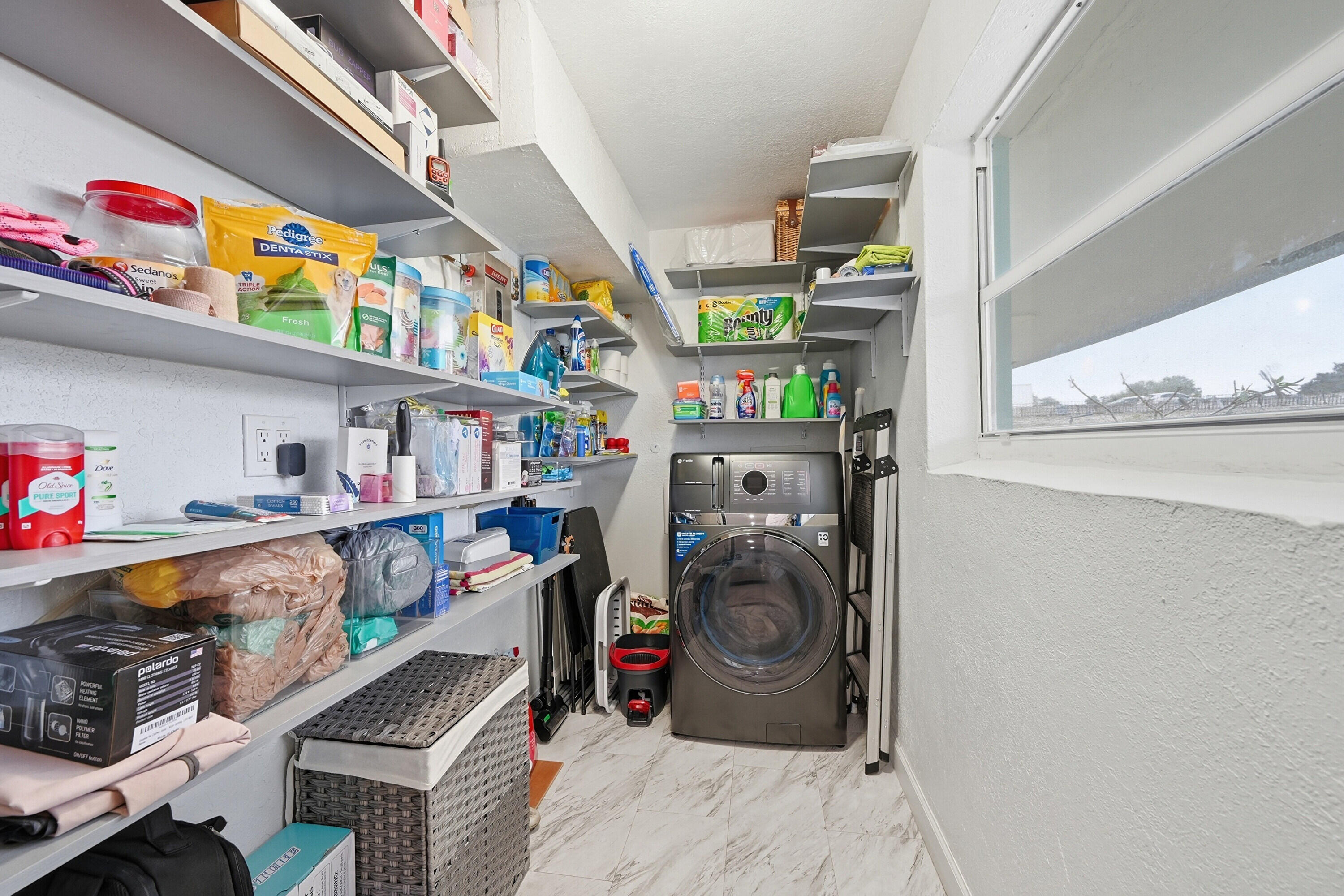 6271 Harding Street Hollywood, FL 33024 - Photo 30 of 58 a utility room with fridge dryer and bicycles