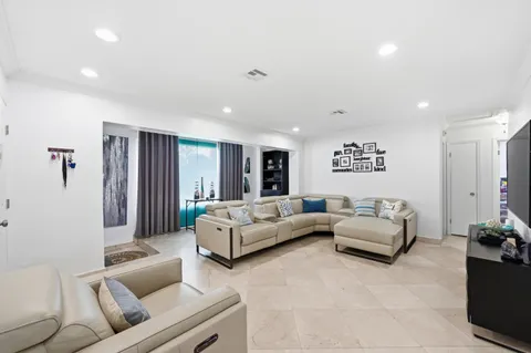 a living room with furniture and a couch