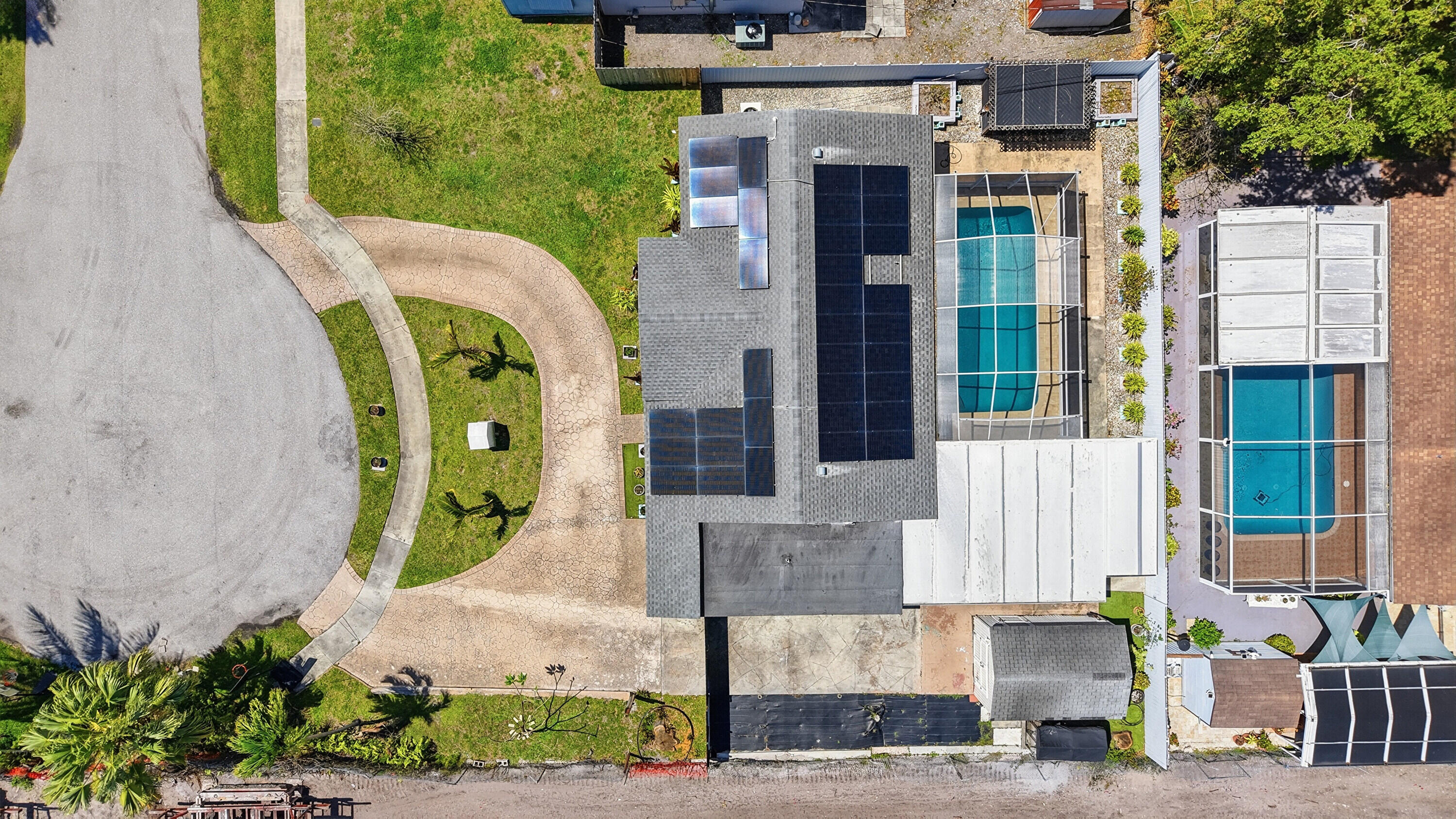 6271 Harding Street Hollywood, FL 33024 - Photo 48 of 58 a front view of a house with a garden