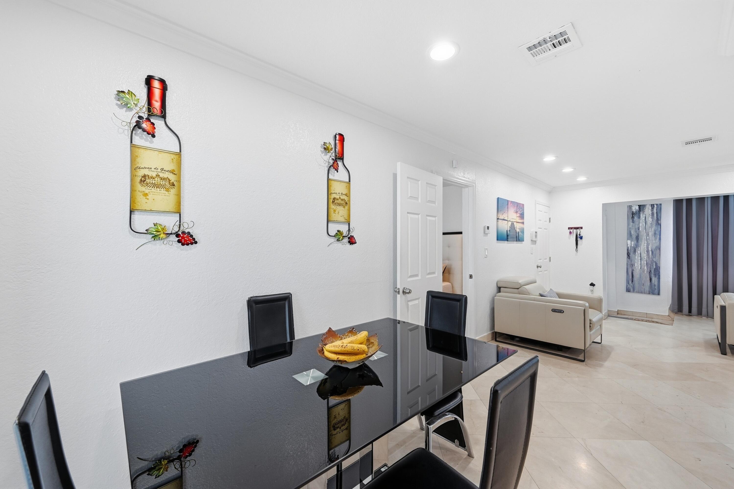 6271 Harding Street Hollywood, FL 33024 - Photo 6 of 58 a living room with furniture and a table