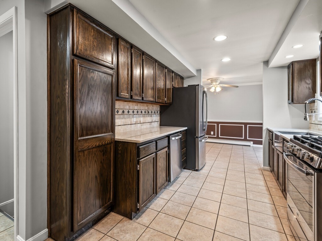281 Brooks Station Road, Unit 1 Princeton, MA 01541 - Photo 14 of 36 a kitchen with stainless steel appliances granite countertop a refrigerator and a stove