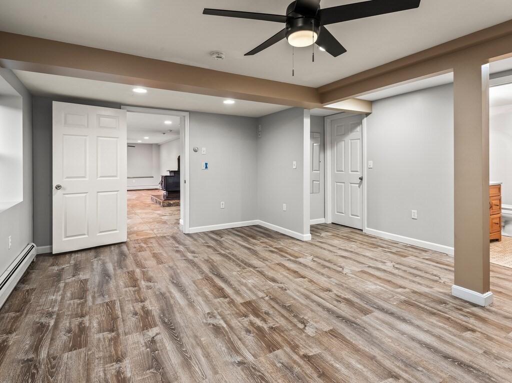 281 Brooks Station Road, Unit 1 Princeton, MA 01541 - Photo 22 of 36 a view of empty room with wooden floor