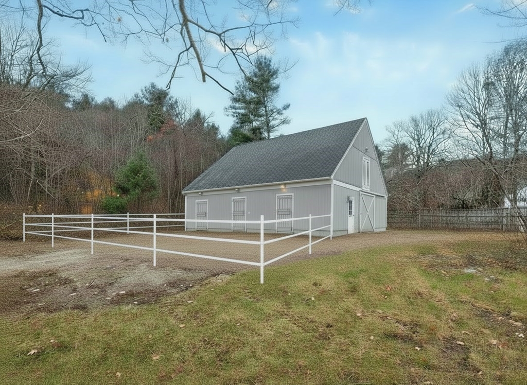 281 Brooks Station Road, Unit 1 Princeton, MA 01541 - Photo 29 of 36 a view of a house with a yard