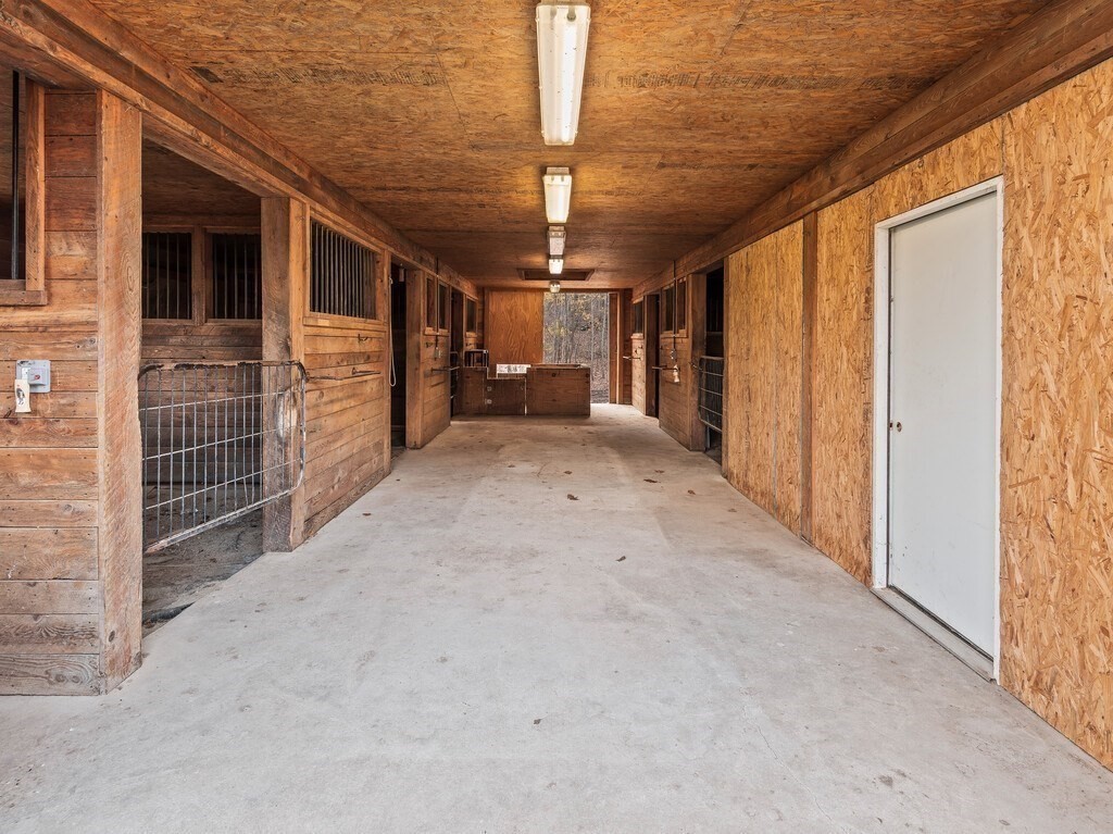 281 Brooks Station Road, Unit 1 Princeton, MA 01541 - Photo 33 of 36 a view of empty room with floor to ceiling window