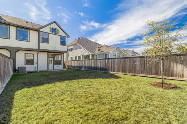 a view of an empty room and closet area