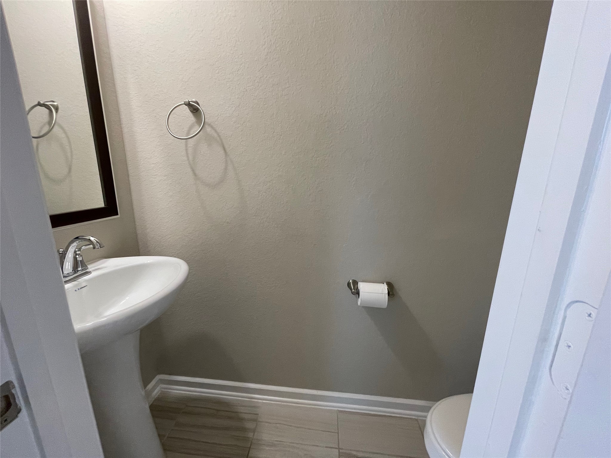 19622 Talley Valley Drive Cypress, TX 77433 - Photo 6 of 18 a bathroom with a sink toilet and shower