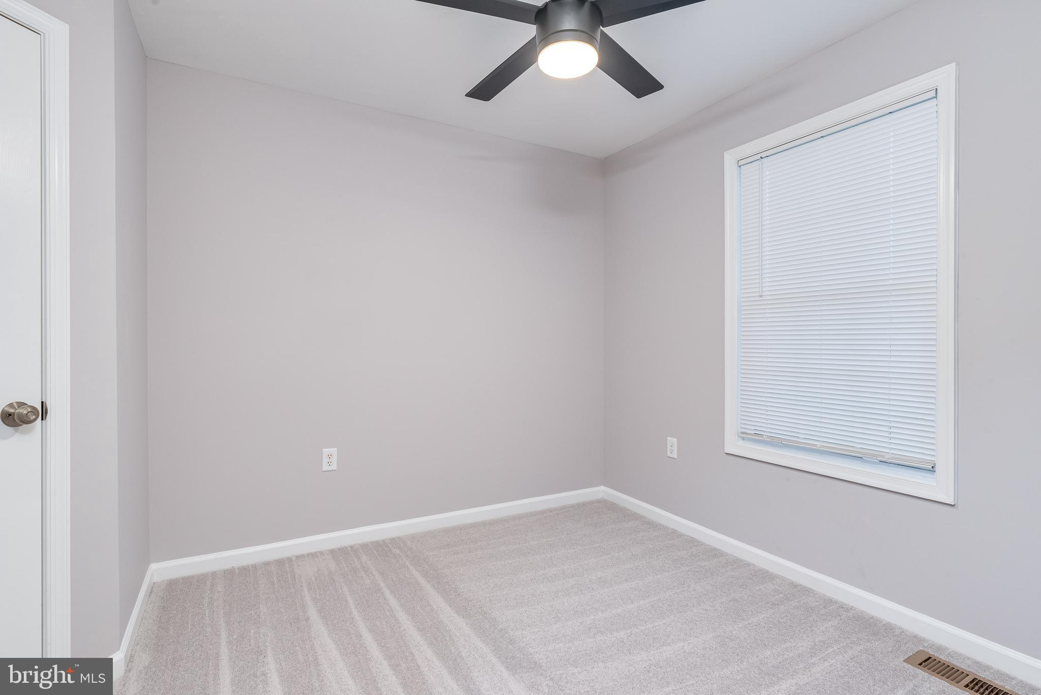 9 Fuzzy Tail Drive Ranson, WV 25438 - Photo 16 of 30 Bedroom 1 w/ new carpet and ceiling fan