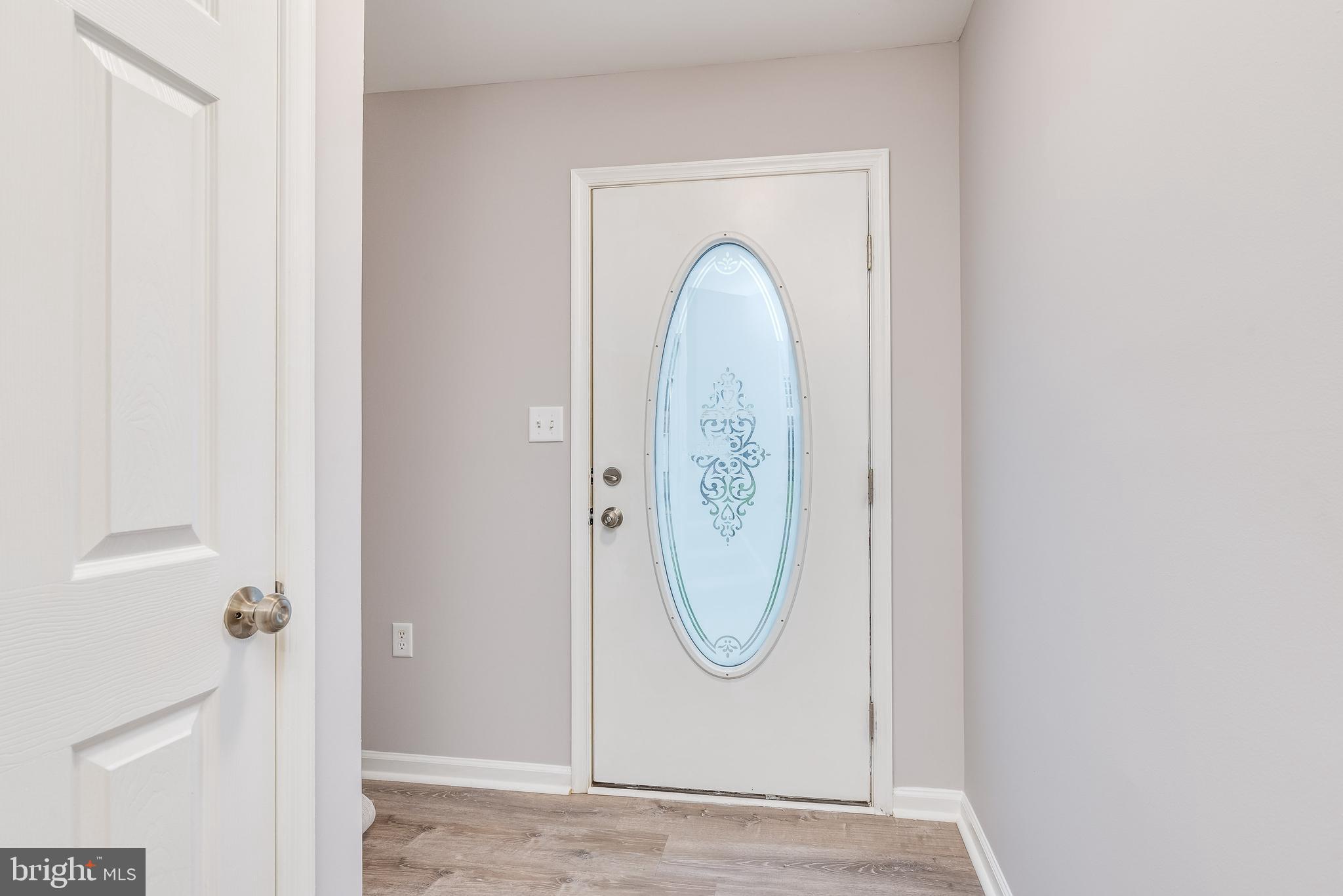 9 Fuzzy Tail Drive Ranson, WV 25438 - Photo 2 of 30 Bright welcoming foyer with LVP