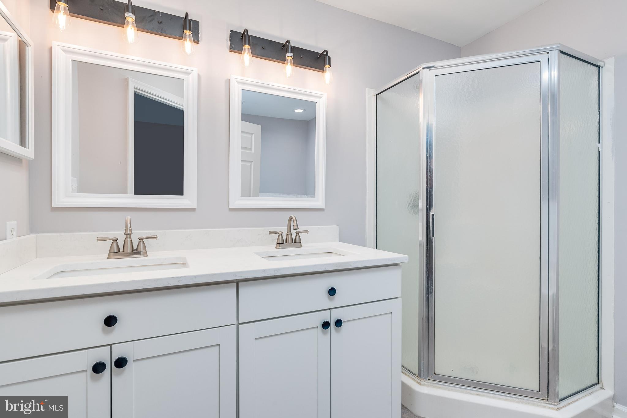 9 Fuzzy Tail Drive Ranson, WV 25438 - Photo 23 of 30 A walk-in shower for quick mornings
