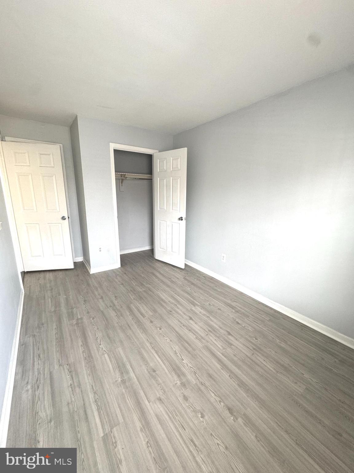 114 Prosperity Avenue Southeast, Unit C Leesburg, VA 20175 - Photo 12 of 18 a view of an empty room and wooden floor