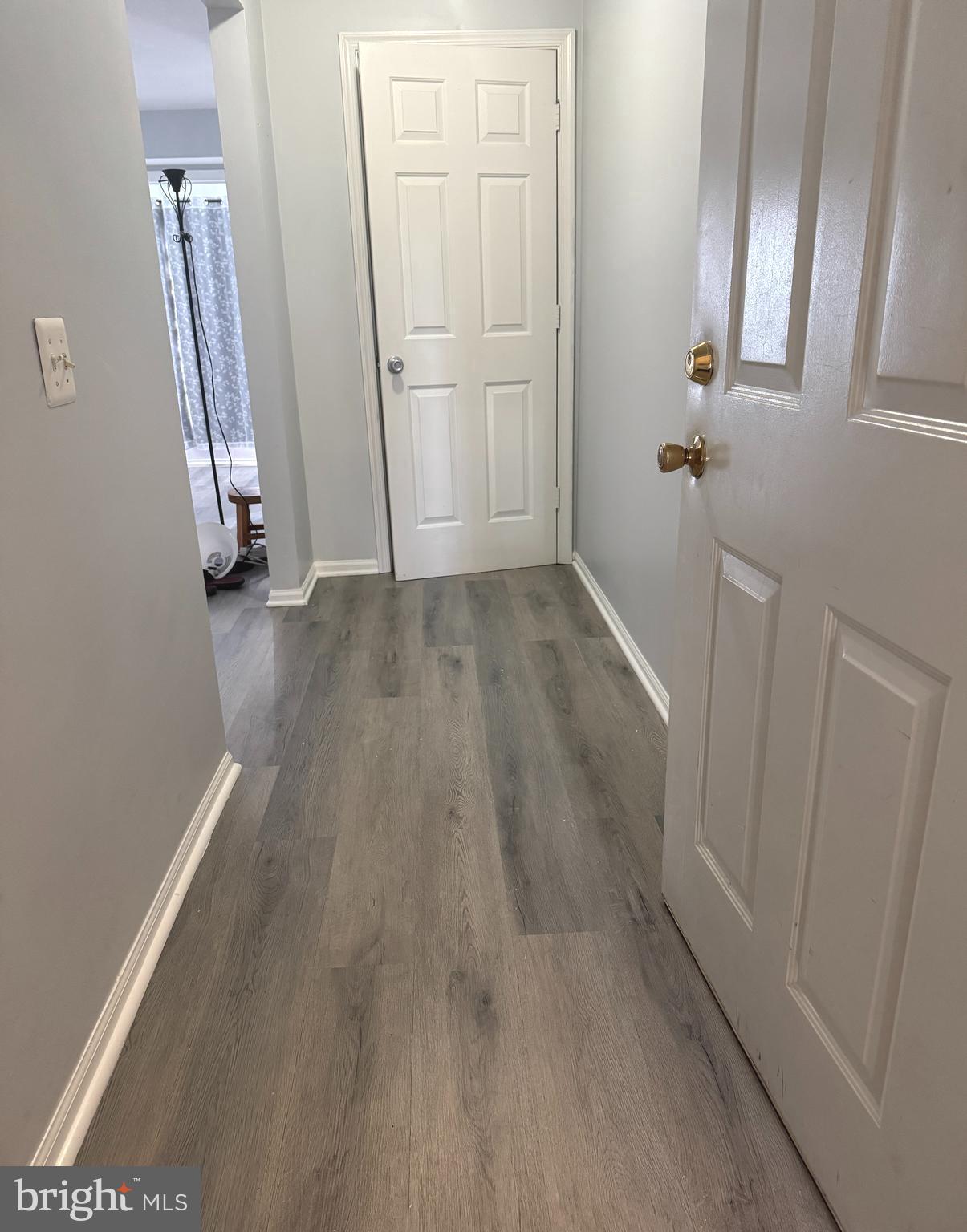 114 Prosperity Avenue Southeast, Unit C Leesburg, VA 20175 - Photo 2 of 18 wooden floor in an empty room