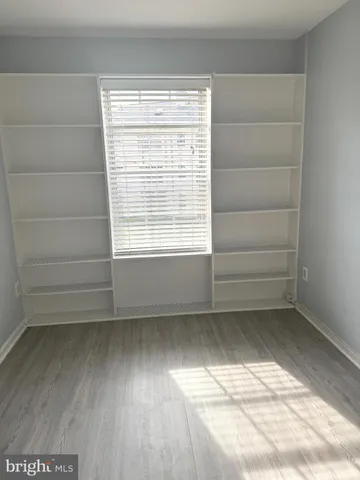 a view of a room that has a window in it