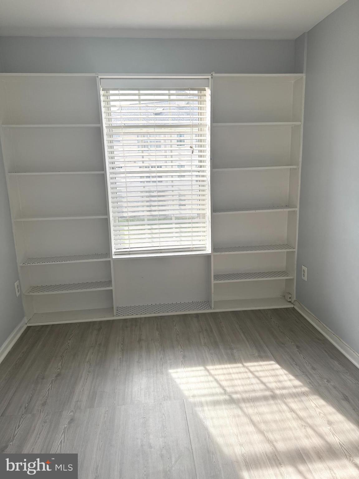 114 Prosperity Avenue Southeast, Unit C Leesburg, VA 20175 - Photo 10 of 18 a view of a room that has a window in it