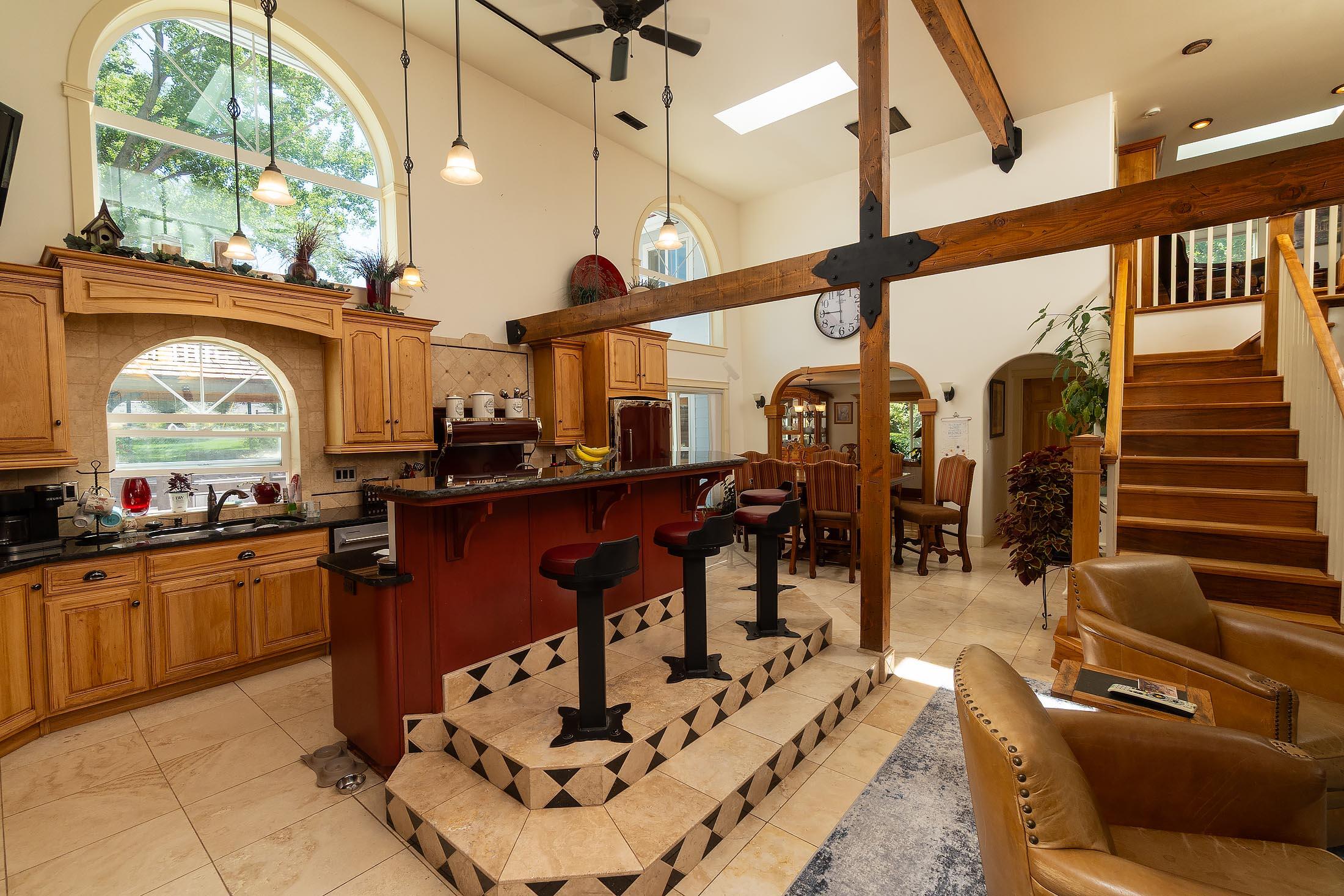 59047 Old Lake Road Christmas Valley, OR 97641 - Photo 35 of 55 Gourmet kitchen island with stools and decorative tile