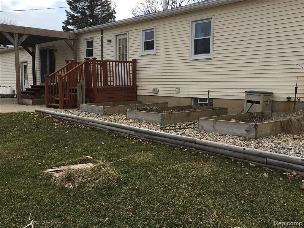 14391 South Duffield Road Byron, MI 48418 - Photo 2 of 16 Back of House with garden.JPG