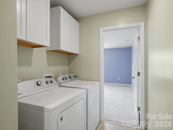 a bathroom with a granite countertop sink a shower and a mirror