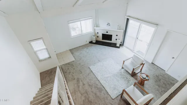 a kitchen with stainless steel appliances a stove a sink and a refrigerator