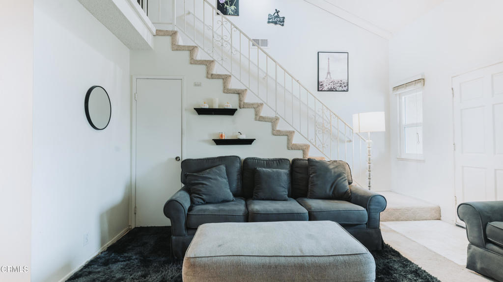 1020 Dunes Street Oxnard, CA 93035 - Photo 45 of 75 a living room with furniture and a potted plant