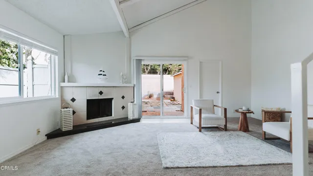 a kitchen with stainless steel appliances granite countertop a refrigerator and a stove