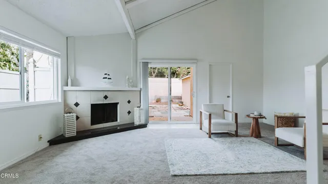 a kitchen with stainless steel appliances granite countertop a stove microwave and cabinets