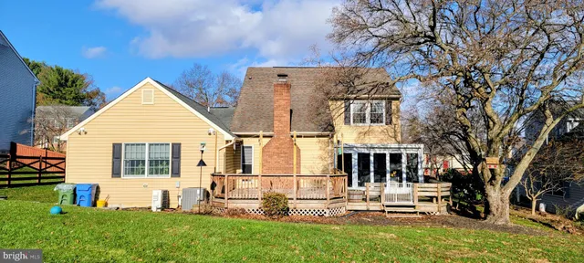 a view of house with yard