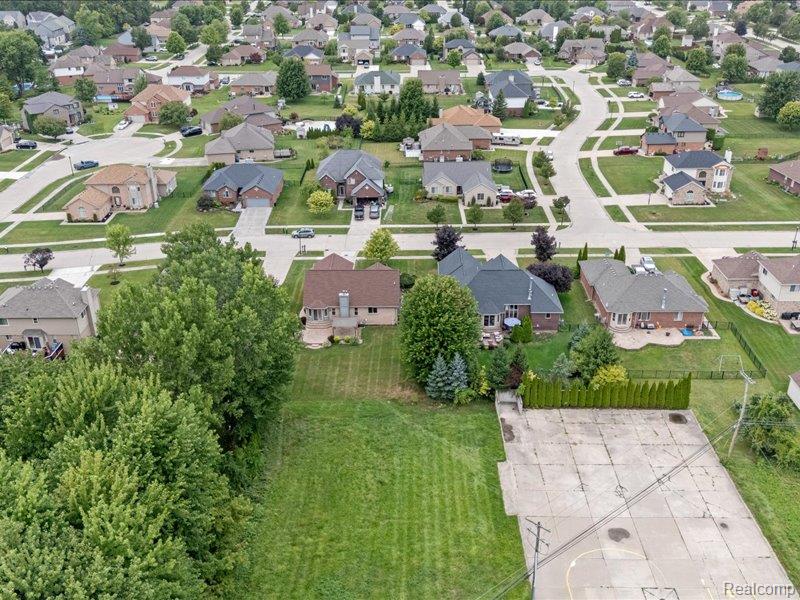 29213 Rachid Lane New Baltimore, MI 48047 - Photo 20 of 26 Aerial view of property and surrounding area with nearby suburban area