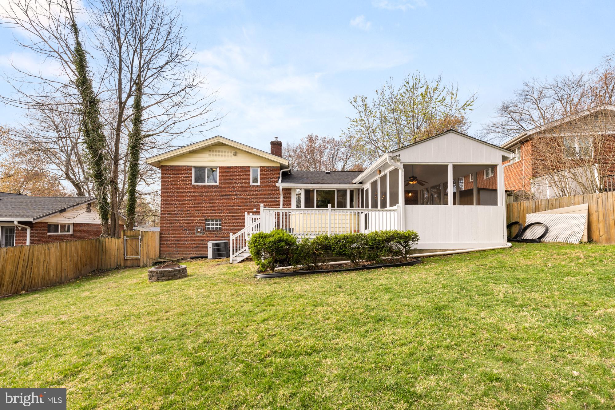 2407 Harmon Road Silver Spring, MD 20902 - Photo 20 of 39 a front view of a house with a yard