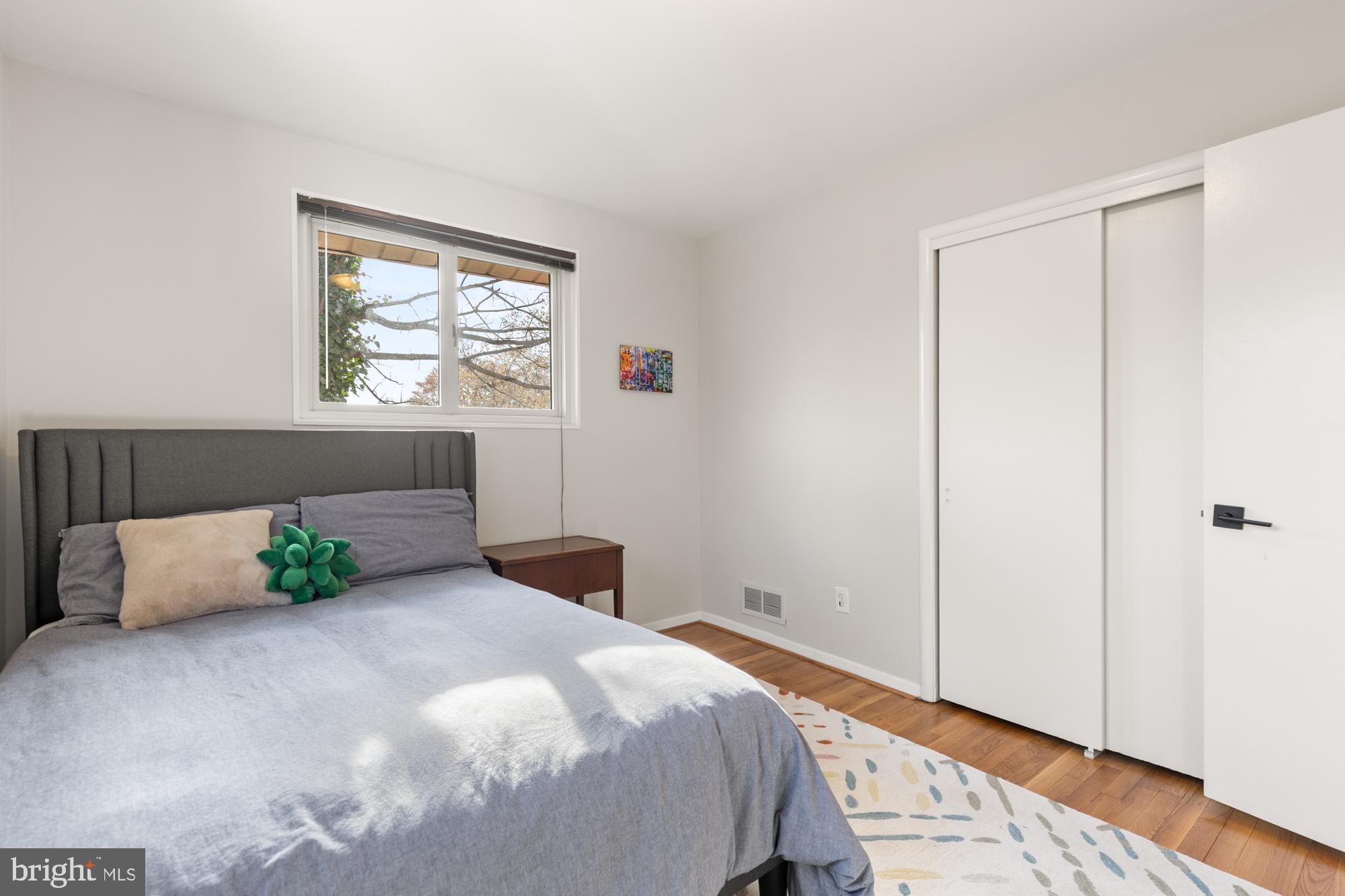 2407 Harmon Road Silver Spring, MD 20902 - Photo 23 of 39 a bedroom with a bed and window