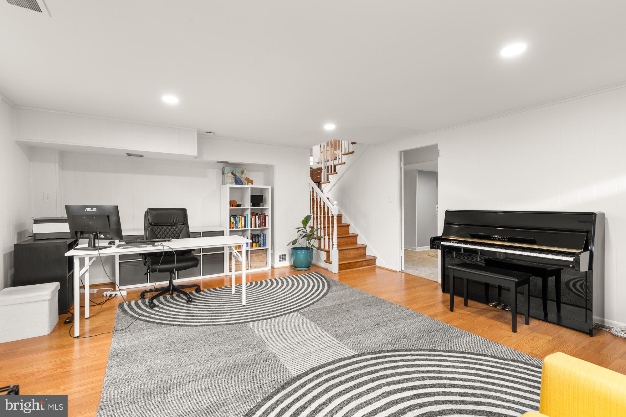 2407 Harmon Road Silver Spring, MD 20902 - Photo 32 of 39 a living room with furniture and a piano