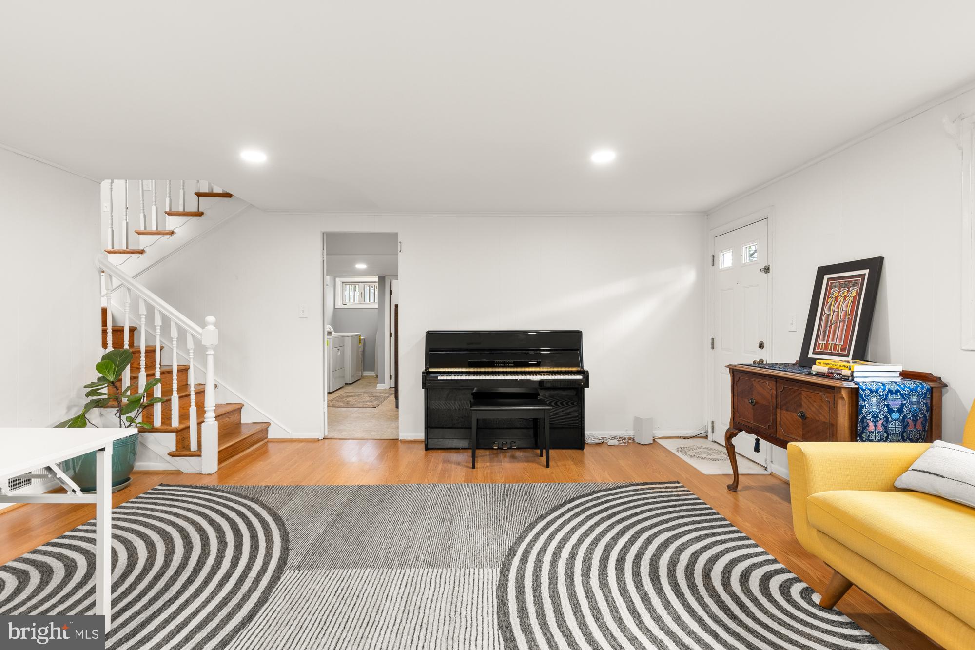 2407 Harmon Road Silver Spring, MD 20902 - Photo 33 of 39 a living room with furniture and a piano