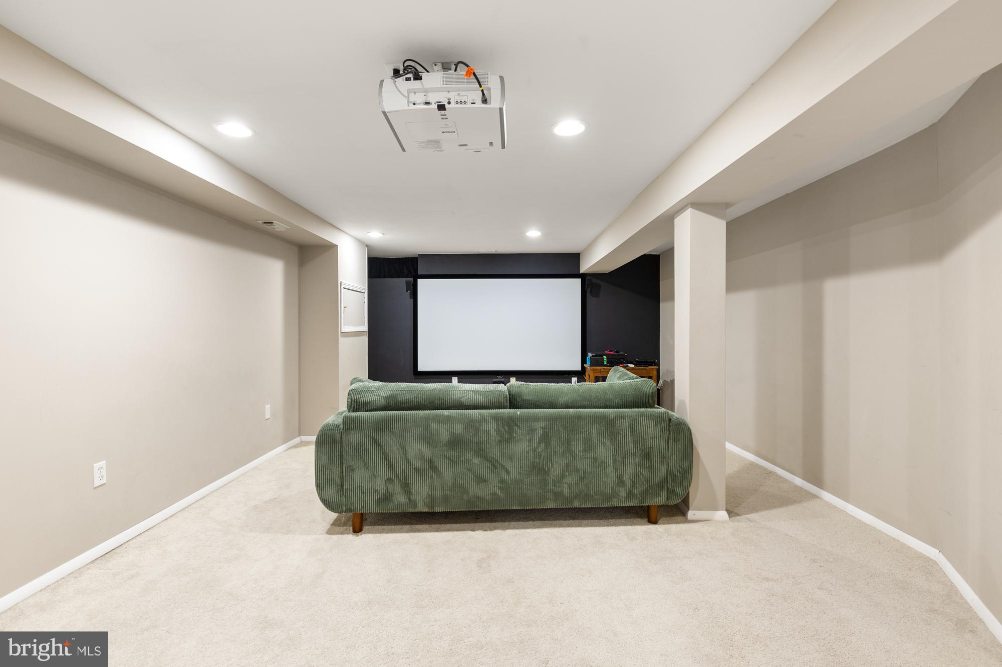 2407 Harmon Road Silver Spring, MD 20902 - Photo 38 of 39 a room with a bed and a flat screen tv