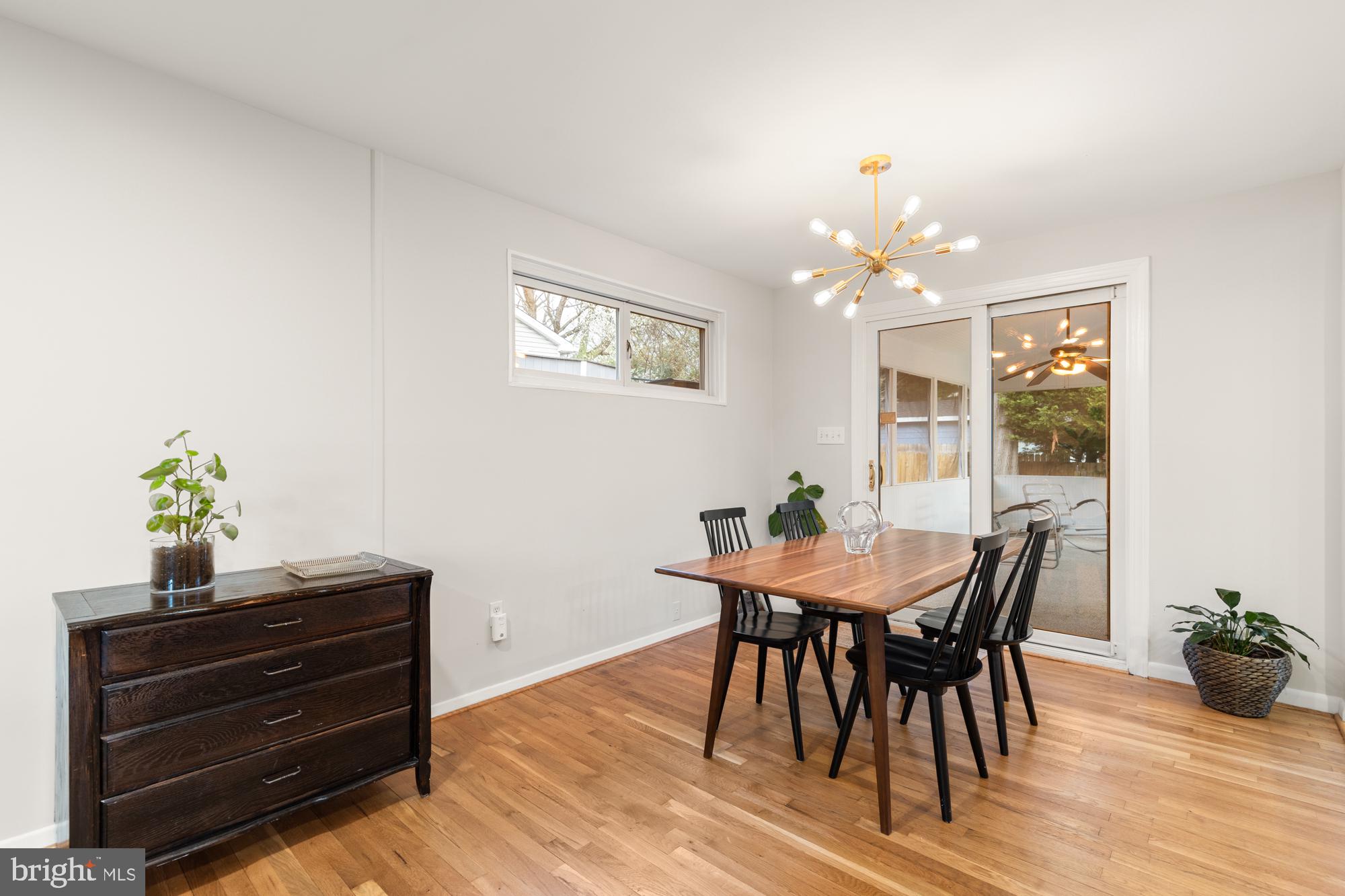 2407 Harmon Road Silver Spring, MD 20902 - Photo 7 of 39 a view of a dining room with furniture and wooden floor