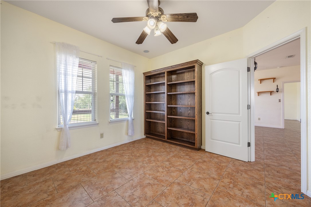 845 Rutherford Fischer, TX 78623 - Photo 11 of 39 a view of an empty room with a window