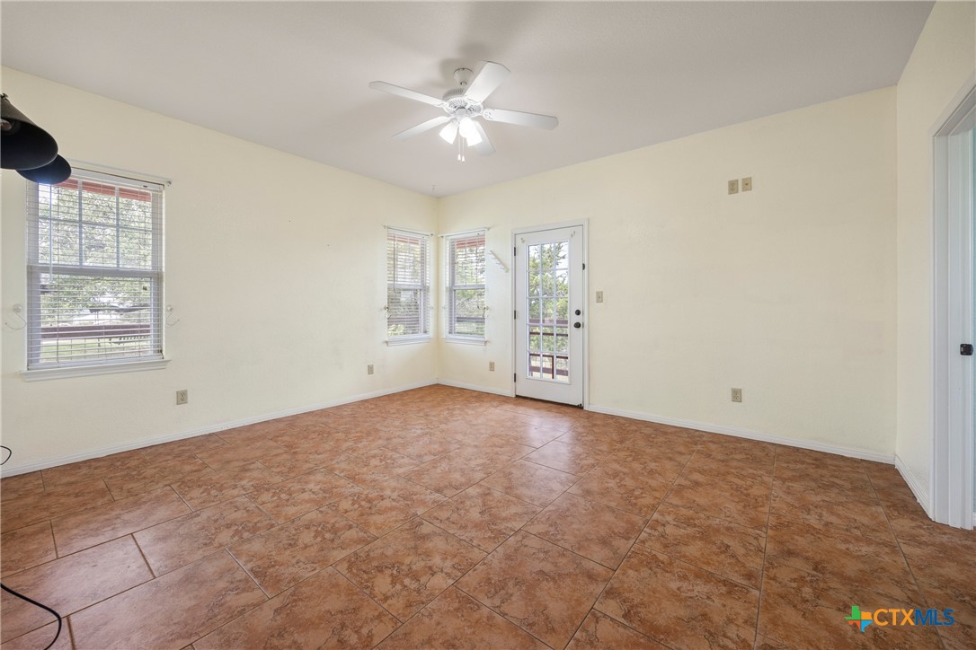 845 Rutherford Fischer, TX 78623 - Photo 12 of 39 a view of an empty room with a window