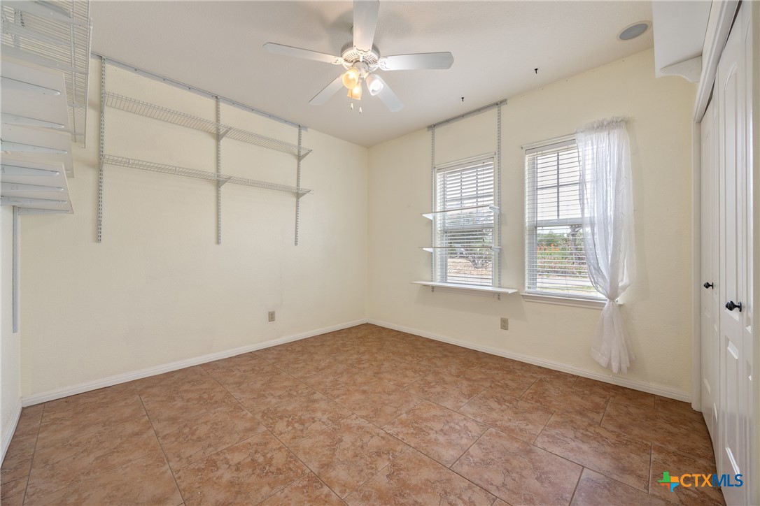 845 Rutherford Fischer, TX 78623 - Photo 20 of 39 a view of an empty room with a window