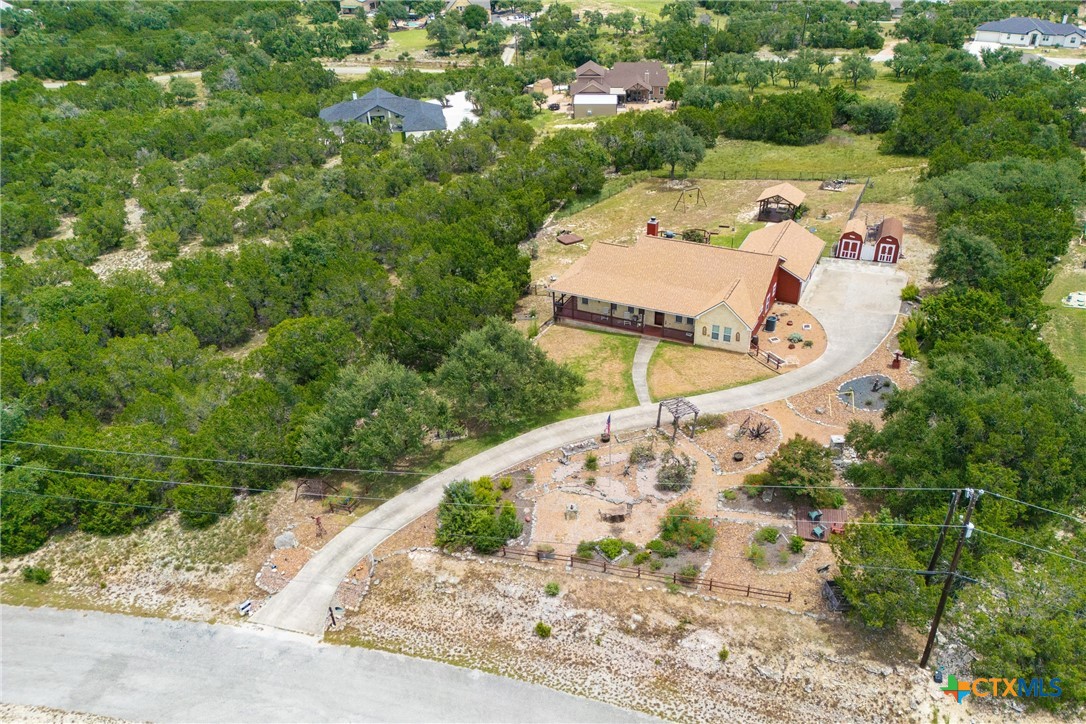 845 Rutherford Fischer, TX 78623 - Photo 2 of 39 an aerial view of a house