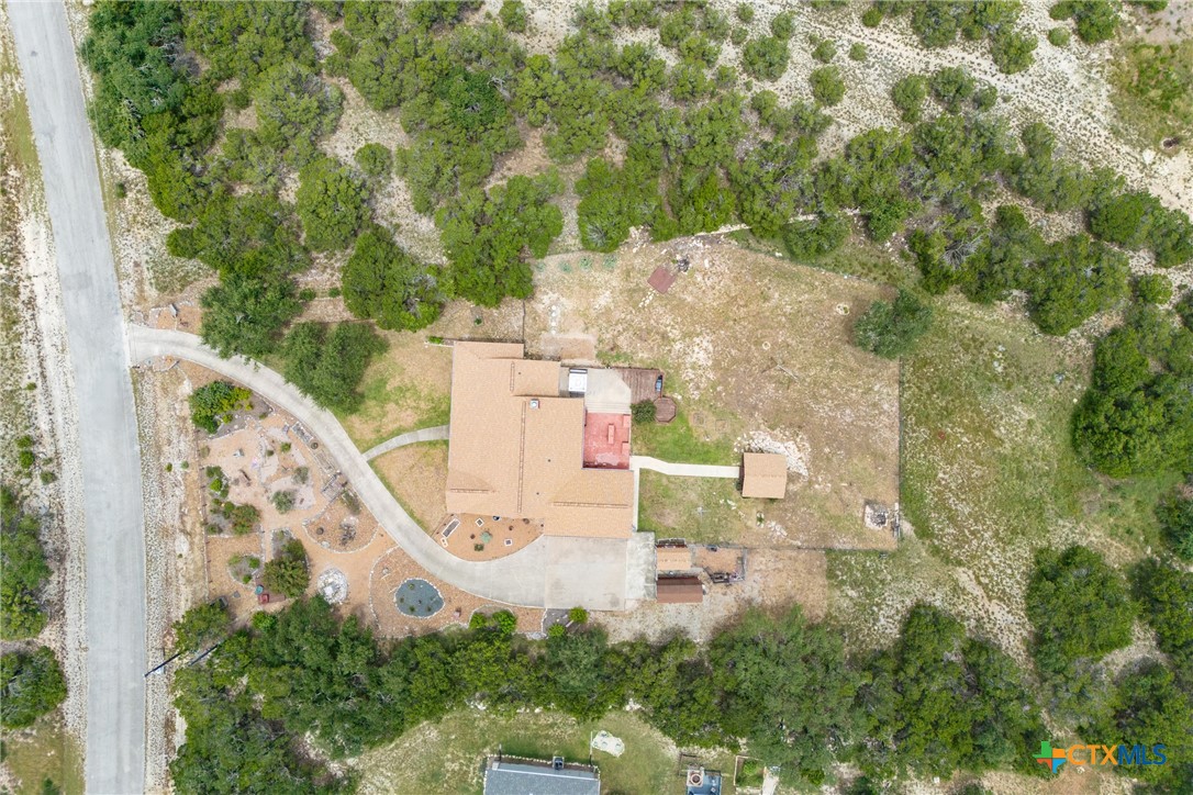845 Rutherford Fischer, TX 78623 - Photo 32 of 39 an aerial view of a house with outdoor space