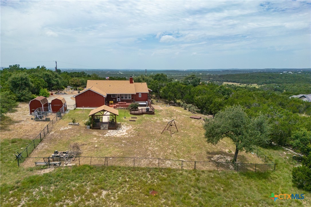 845 Rutherford Fischer, TX 78623 - Photo 38 of 39 an aerial view of a house with yard swimming pool and outdoor seating