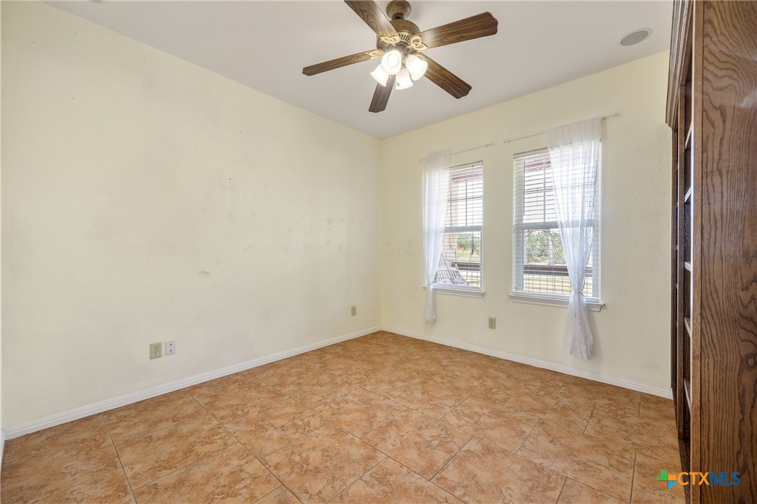 845 Rutherford Fischer, TX 78623 - Photo 10 of 39 a view of an empty room with a window