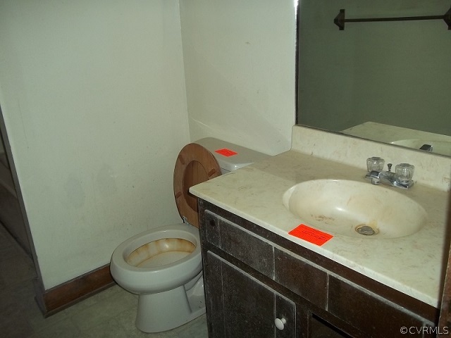 4418 Tatum Road Disputanta, VA 23842 - Photo 5 of 8 a bathroom with a sink and toilet