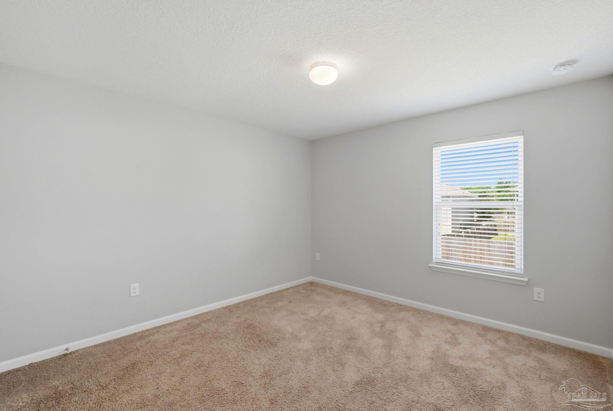 5881 Bay Tree Court Milton, FL 32570 - Photo 22 of 51 an empty room with a window