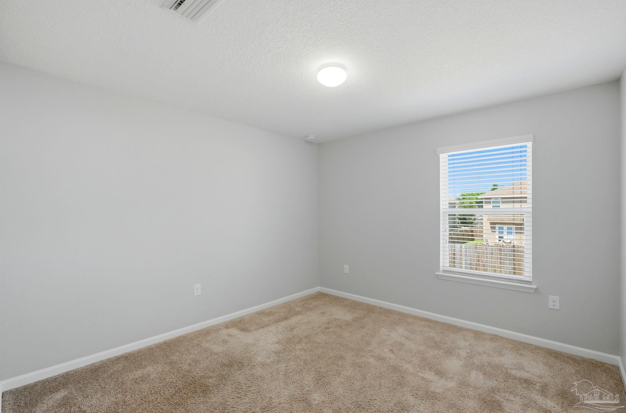 5881 Bay Tree Court Milton, FL 32570 - Photo 24 of 51 an empty room with a window