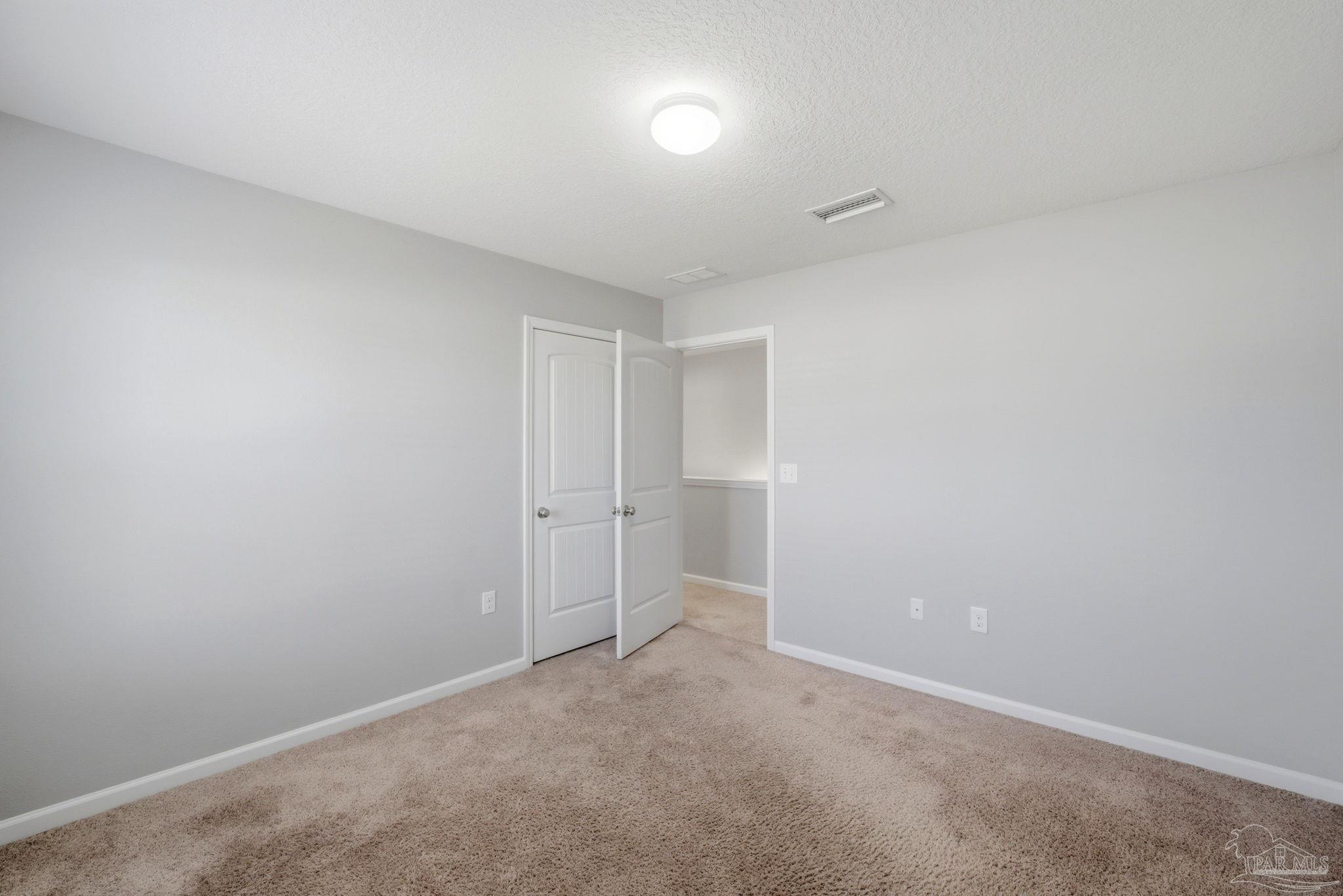 5881 Bay Tree Court Milton, FL 32570 - Photo 25 of 51 a view of an empty room