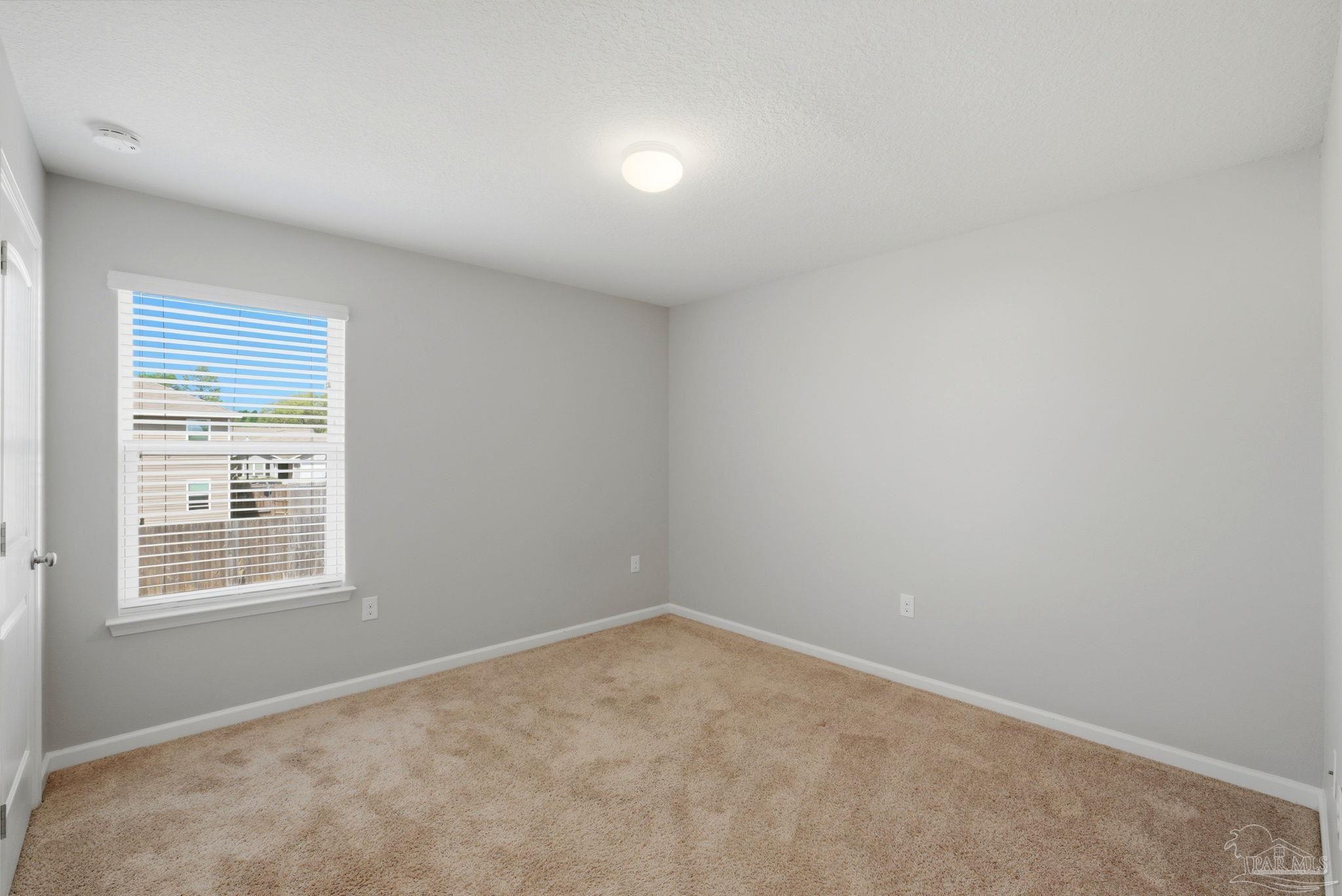 5881 Bay Tree Court Milton, FL 32570 - Photo 26 of 51 an empty room with a window