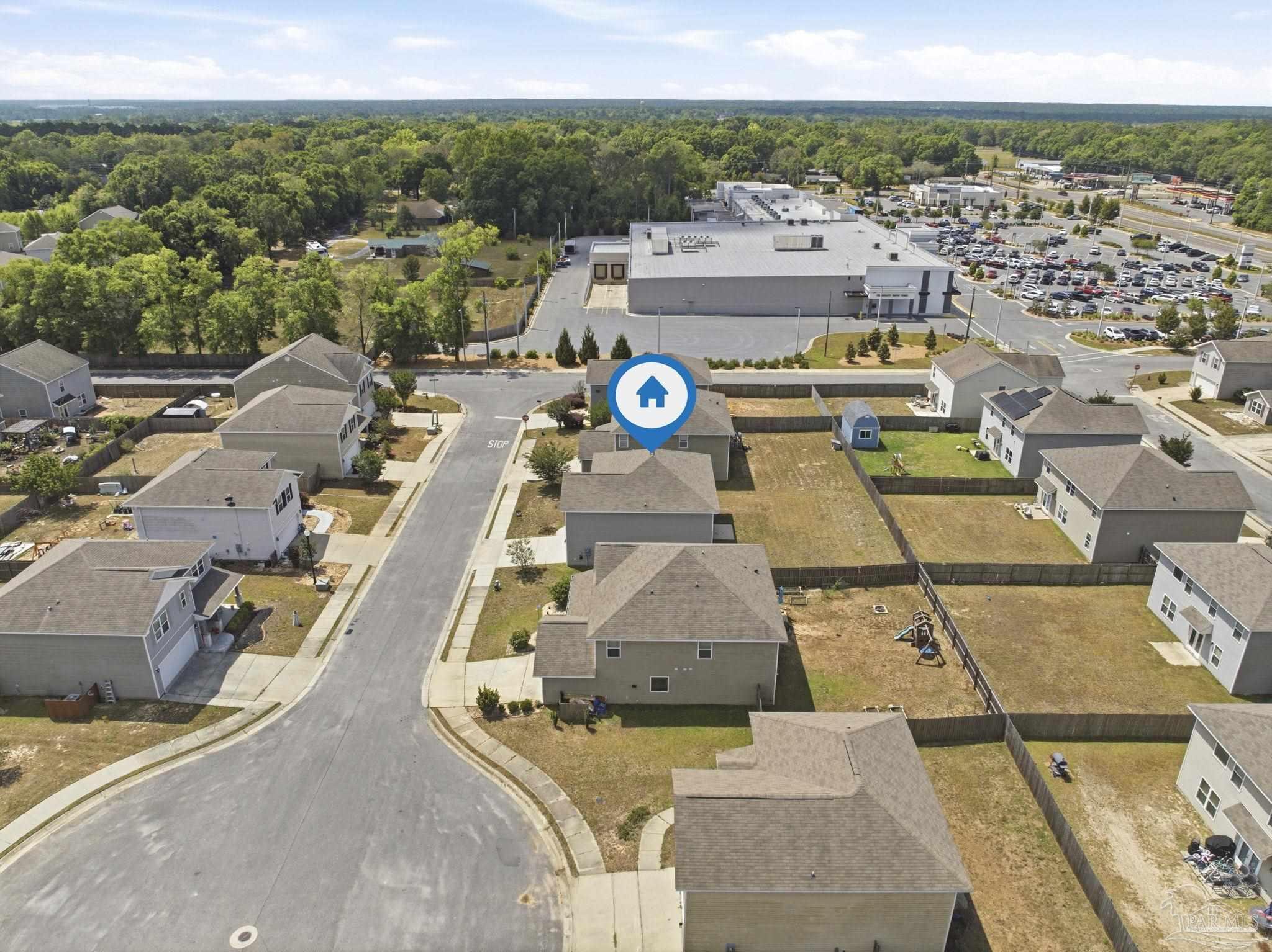 5881 Bay Tree Court Milton, FL 32570 - Photo 35 of 51 an aerial view of a residential houses with outdoor space