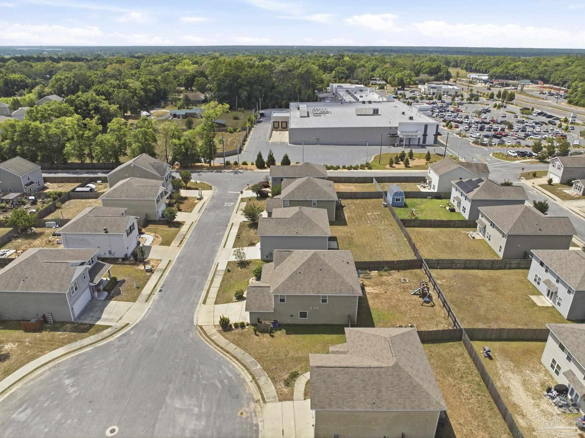 5881 Bay Tree Court Milton, FL 32570 - Photo 36 of 51 an aerial view of a residential houses with outdoor space