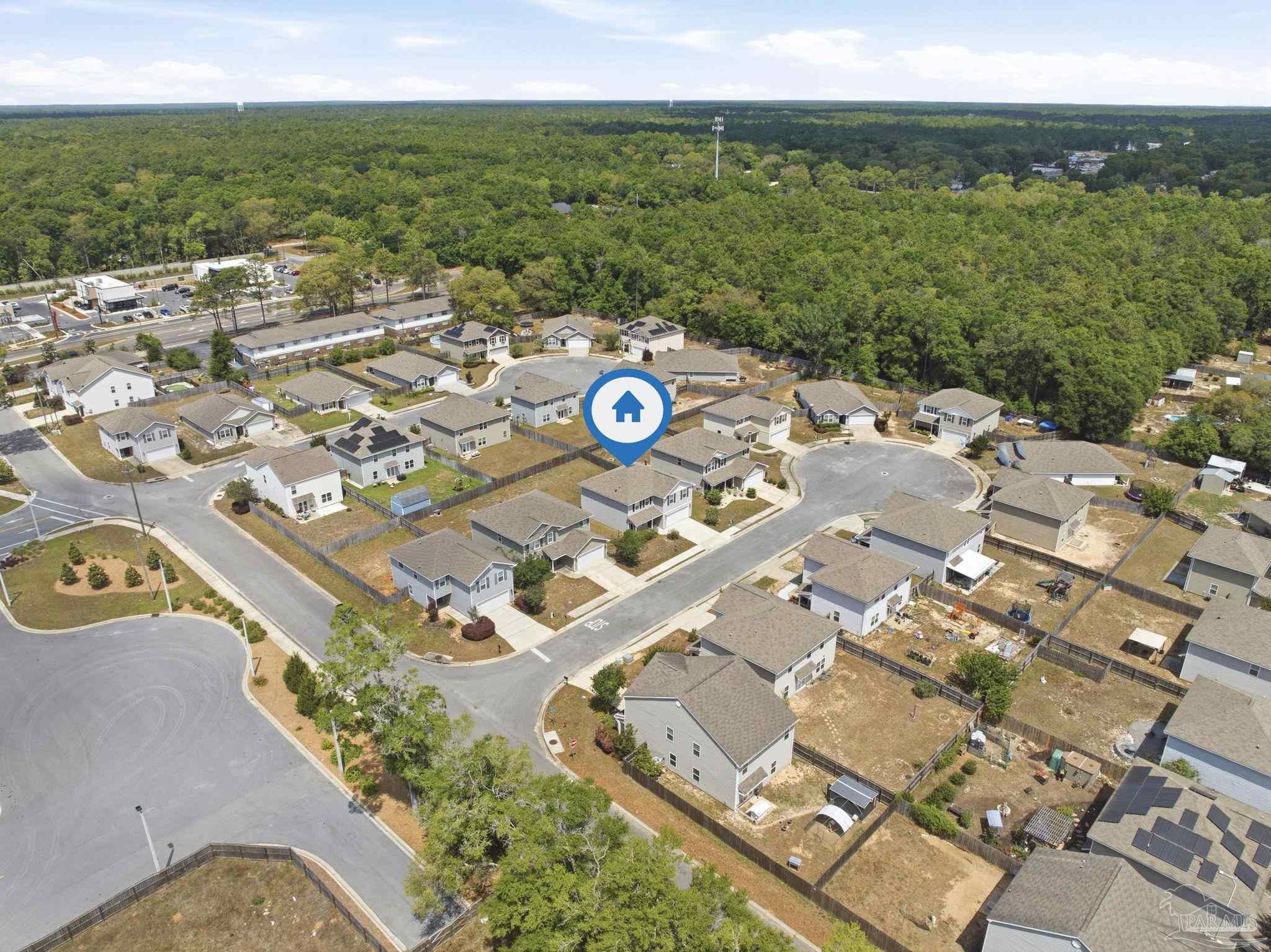 5881 Bay Tree Court Milton, FL 32570 - Photo 40 of 51 an aerial view of a city with lots of residential buildings