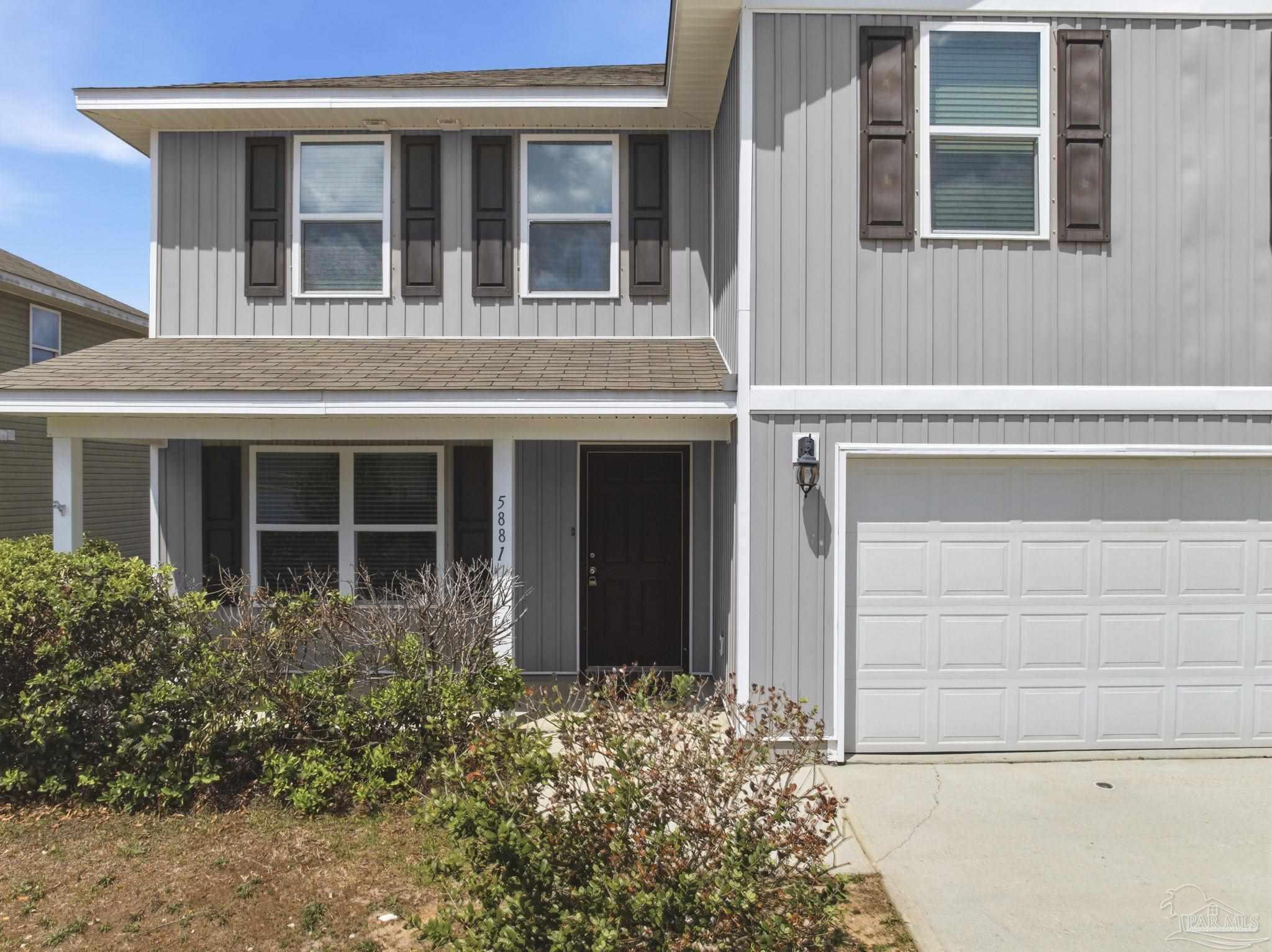 5881 Bay Tree Court Milton, FL 32570 - Photo 4 of 51 front view of a building