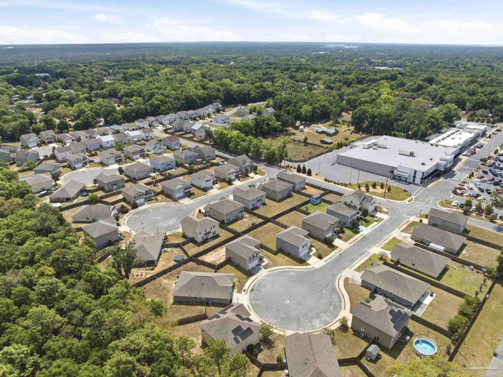5881 Bay Tree Court Milton, FL 32570 - Photo 47 of 51 an aerial view of residential houses with outdoor space