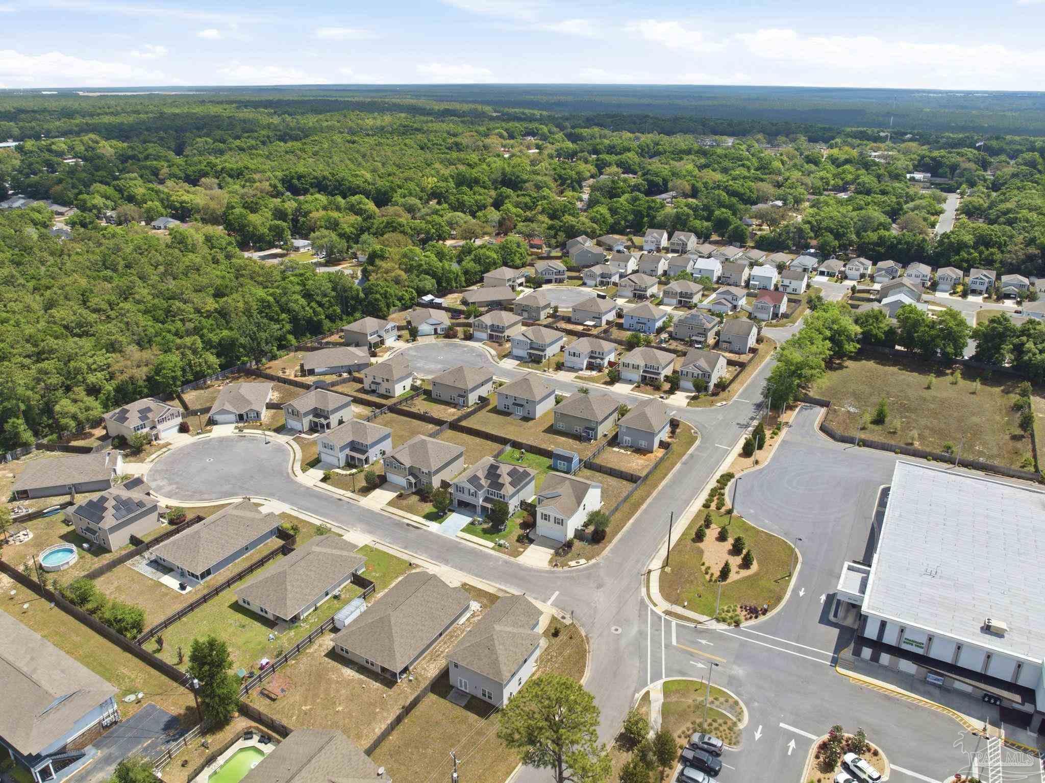 5881 Bay Tree Court Milton, FL 32570 - Photo 48 of 51 an aerial view of a city with ocean view